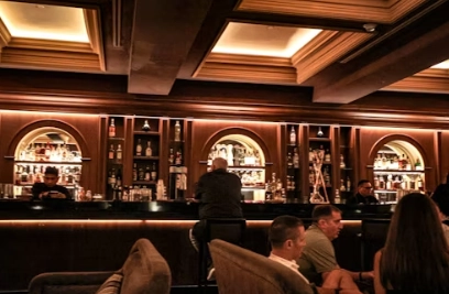 1770092816206466.webp people sitting at a bar.webp