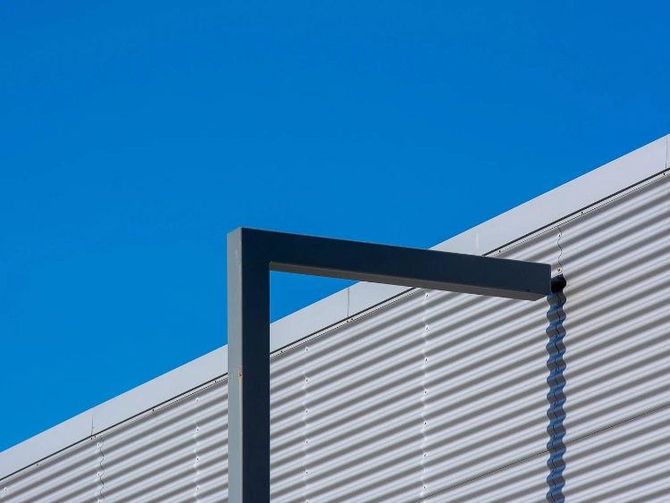 metal facade panels exposed to weather.webp